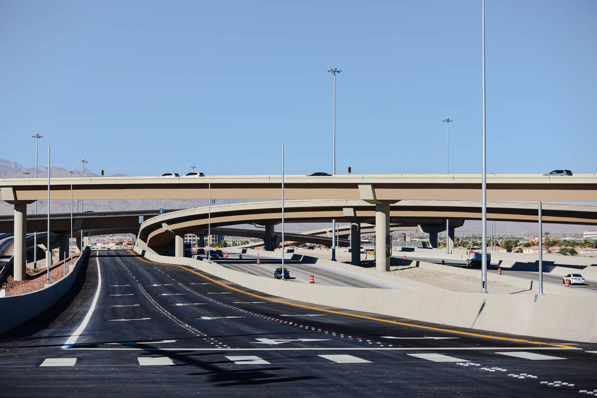 The view of Oso Blanco Road as it leads towards the Sky Pointe Drive bridge, newly created as p ...