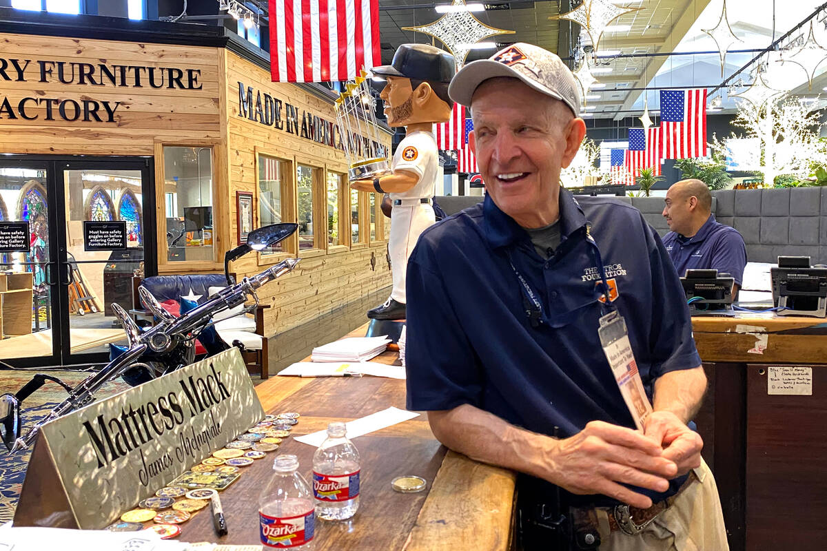 Houston furniture store owner Jim "Mattress Mack" McIngvale, 68, mans the counter in ...