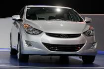 A 2013 Hyundai Elantra Coupe is shown at the Chicago Auto Show in Chicago on Feb. 8, 2012. In S ...