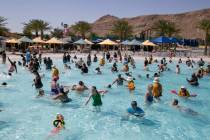 Friends and families attempt to break the world record for largest swimming lesson at Wet 'n' W ...