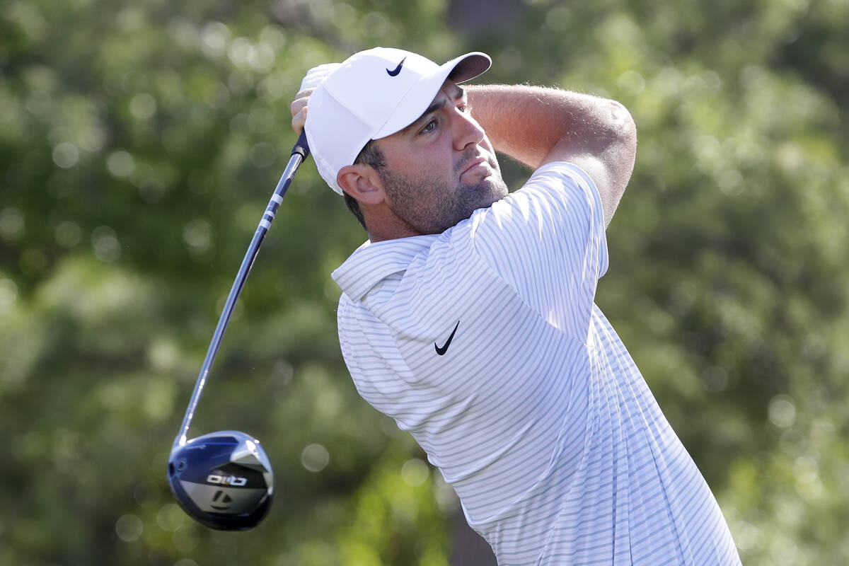 Scottie Scheffler tees off on the first hole during the first round of the Houston Open golf to ...