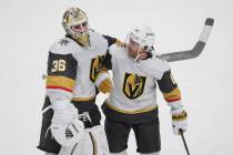 Vegas Golden Knights goaltender Logan Thompson (36) and right wing Jonathan Marchessault celebr ...