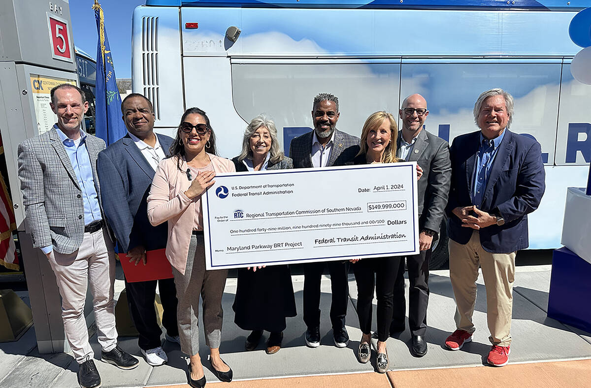 Clark County Commissioner Justin Jones (left), UNLV President Keith Whitfield , Federal Transpo ...