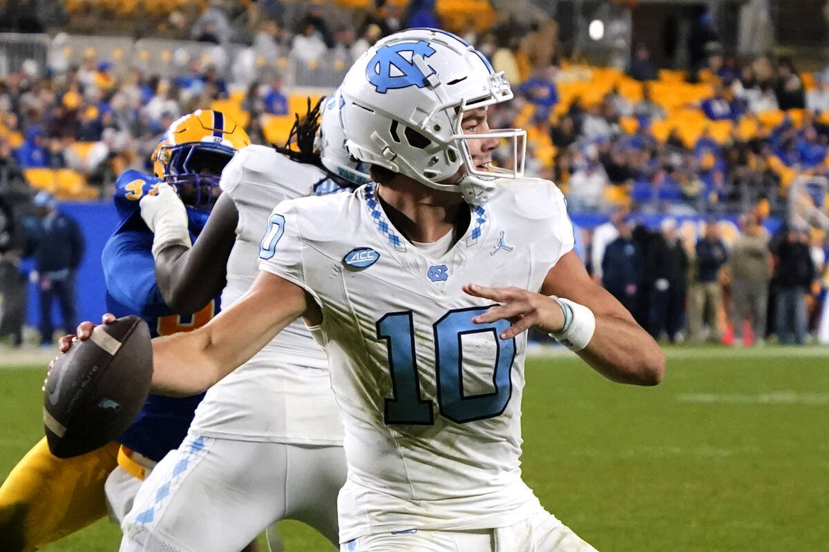 North Carolina quarterback Drake Maye (10) looks to throw a pass from the end zone during the s ...