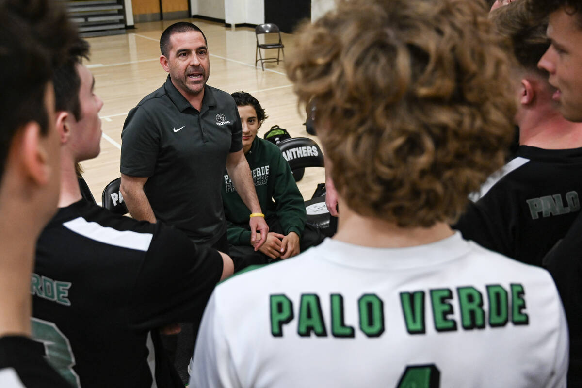 Palo Verde volleyball coach Phil Clarke talks to his players during a time out in their NIAA vo ...