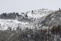 The snow level on a mountain peak is seen near Phillips Station, Calif., Tuesday, Jan. 2, 2024. ...
