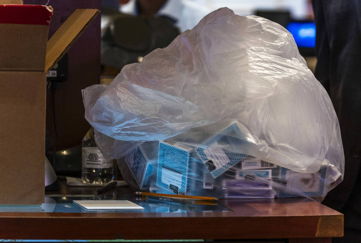 A bag of playing cards is set aside following the final table games during the final night of g ...