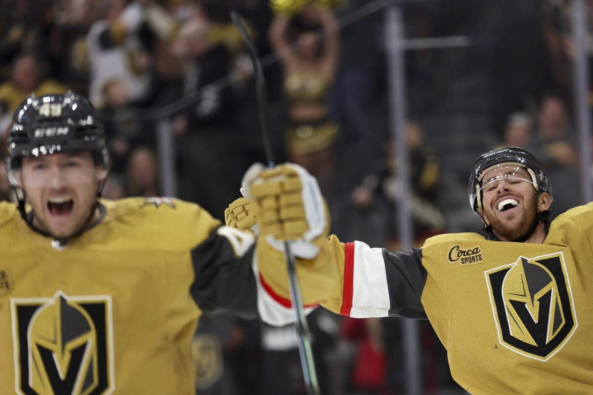 Golden Knights center Ivan Barbashev (49) and right wing Jonathan Marchessault (81) celebrate a ...