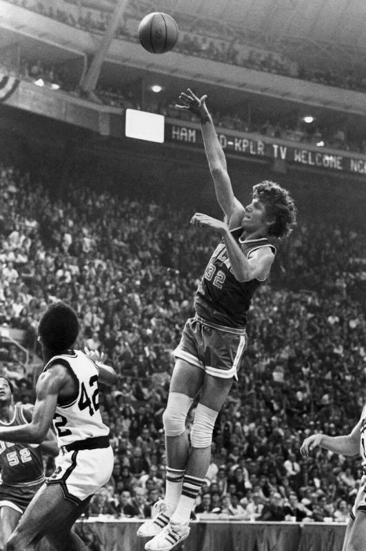 FILE - UCLA center Bill Walton (32) shoots for two of his record 44 points against Memphis Stat ...