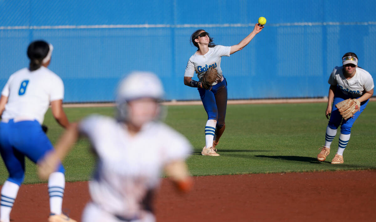 Green Valley’s Lyla Baxter (9) throws in the ball against Bishop Gorman in the sixth inn ...