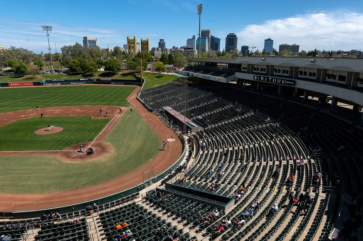 Baseball fans watch the first game at Sutter Health Park during a AAA alternate site scrimmage ...