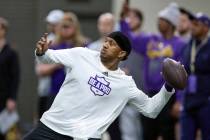 Washington quarterback Michael Penix Jr. throws a pass during the NCAA college's NFL football p ...