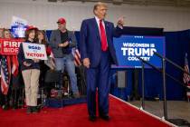Republican presidential candidate former President Donald Trump takes the stage before speaking ...