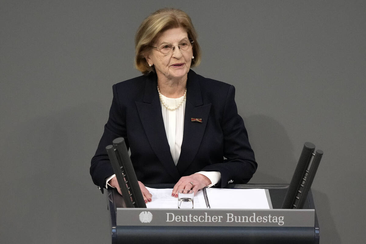 FILE - Holocaust survivor Eva Szepesi speaks to the plenary of the German Bundestag in Berlin, ...