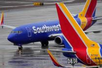 FILE - A Southwest Airlines jet arrives at Sky Harbor International Airport in Phoenix on Dec. ...