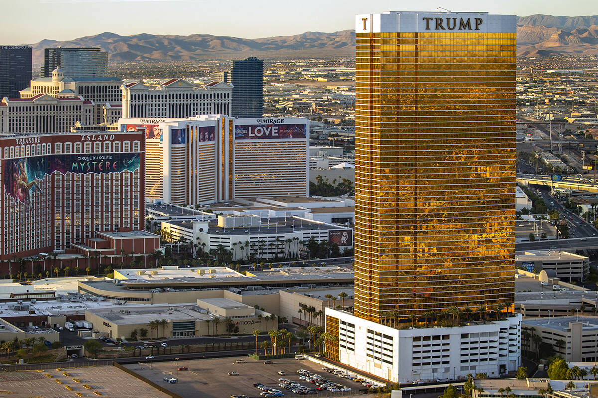 The Trump International, right, is seen with other properties on the Las Vegas Strip during an ...