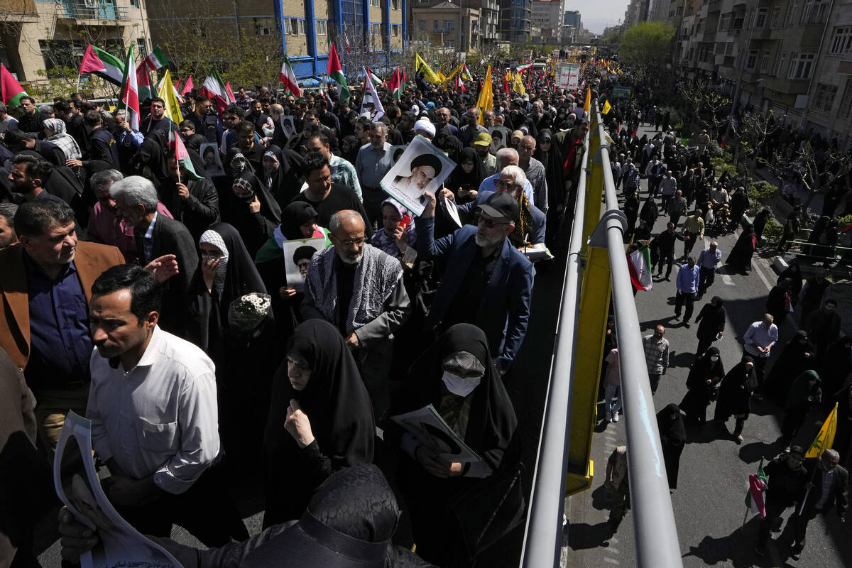 Iranians attend an annual rally to mark Quds Day, or Jerusalem Day, to support the Palestinians ...