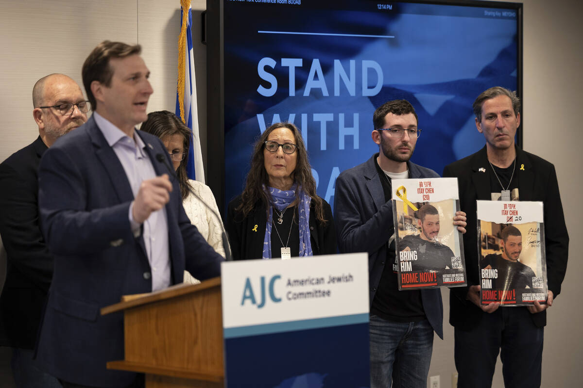 Families of American hostages in Gaza listen to Congressman Dan Goldman speaks during a press c ...