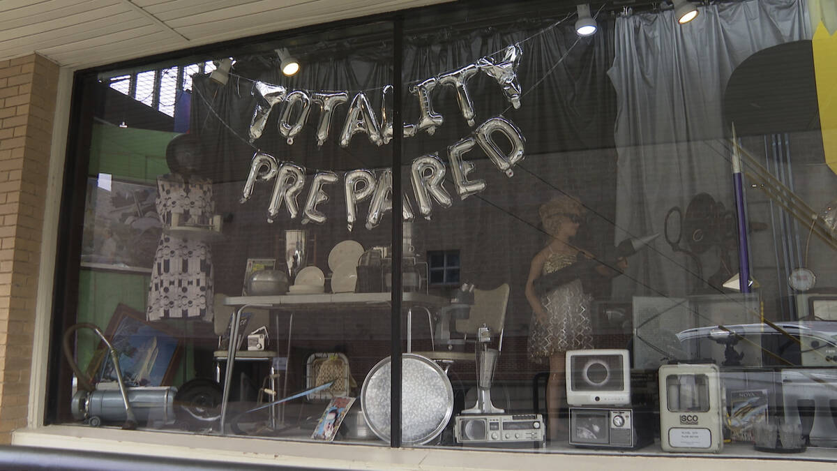 An antique shop displays “Totality Prepared” sign ahead of the solar eclipse in W ...