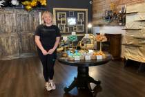 Kalee Hume stands alongside her handmade eclipse-themed soaps at her shop in downtown Waxahachi ...
