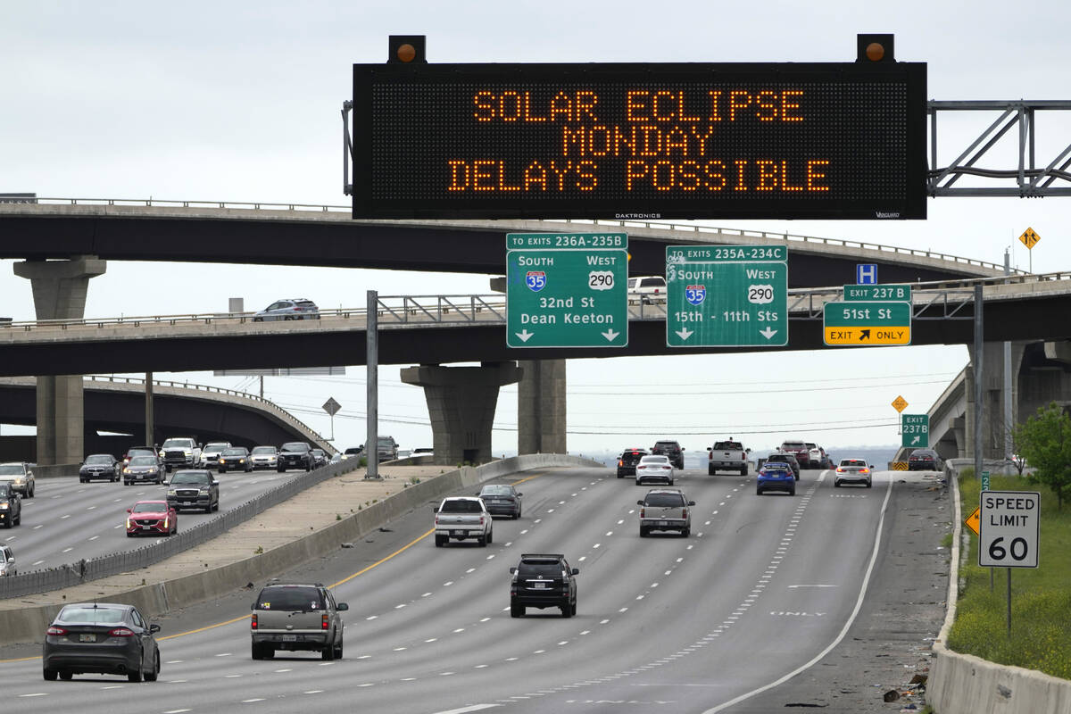 Motorists traveling toward Austin, Texas are reminded of Monday's eclipse and the possibility o ...