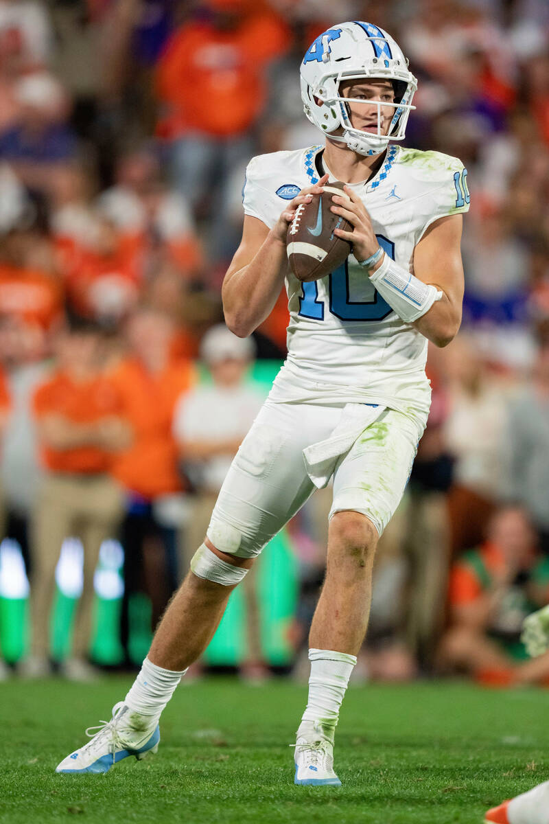 North Carolina quarterback Drake Maye (10) looks to pass against Clemson during an NCAA college ...