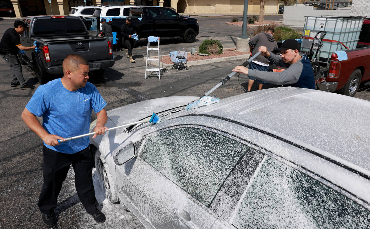 Rigo Cardoza, whose brother Raul Cardoza was shot and killed as they worked together, right, an ...