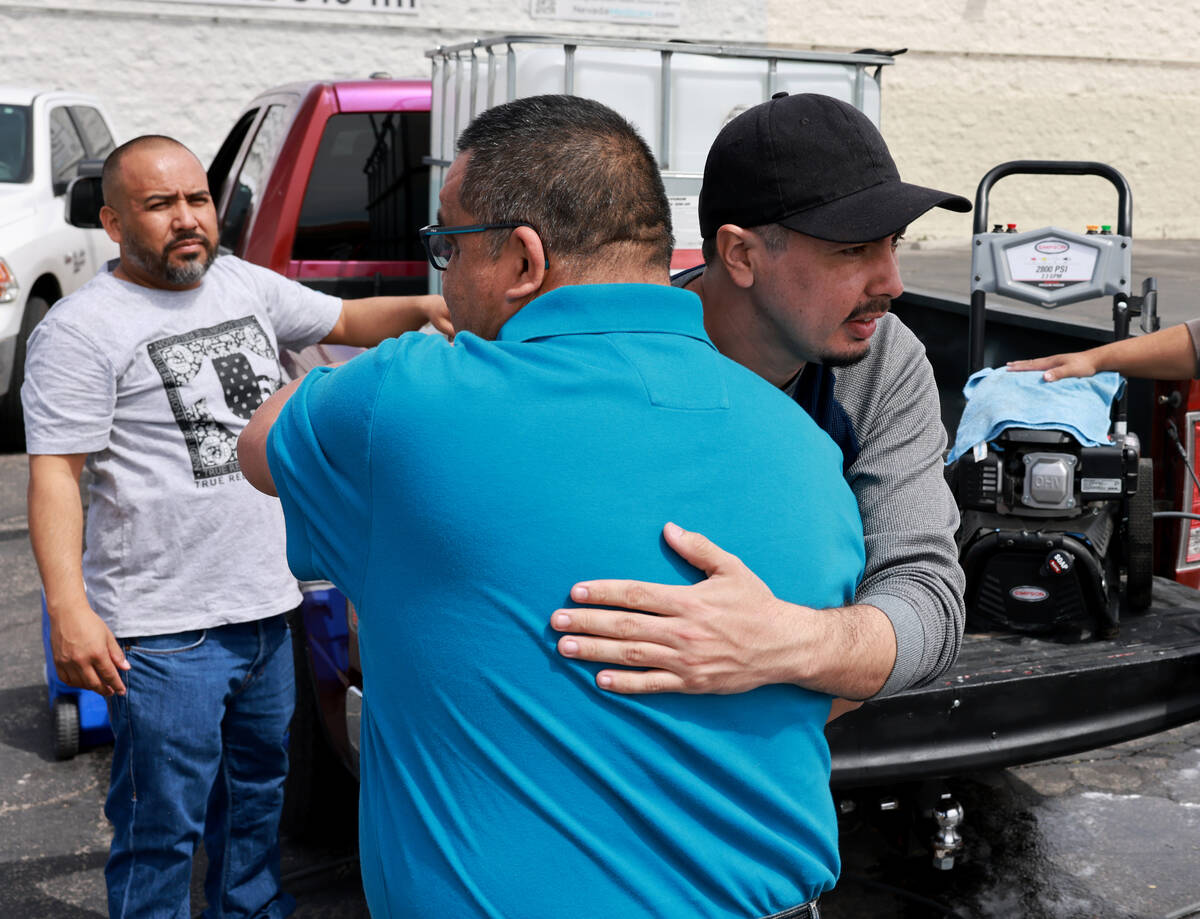Rigo Cardoza, whose brother Raul Cardoza was shot and killed as they worked together, right, hu ...