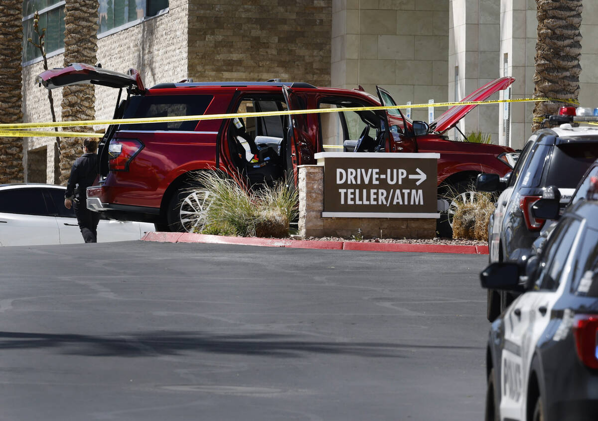 Las Vegas police investigate a shooting at City National Bank Building office building on Monda ...