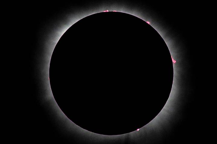 Totality happens during the total solar eclipse viewed from the Reunion Tower on Monday, April ...