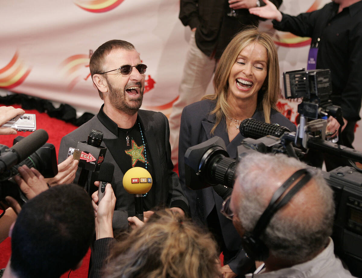 Ringo Starr and his wife Barbara Bach laugh as they talk with he media on the red carpet at the ...