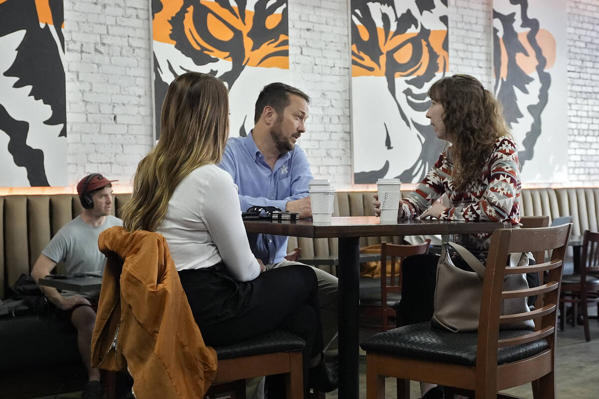Customers drink coffee at the Blind Tiger Cafe Jan. 10, 2024, in Tampa, Fla. On Wednesday, Apri ...
