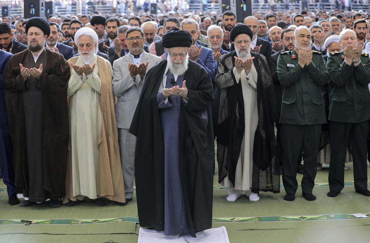 In this photo released by an official website of the office of the Iranian supreme leader, Ayat ...