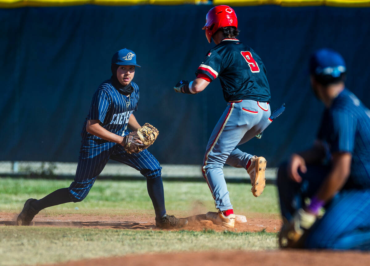 Cheyenne infielder Raider Campos tags first base just for an out ahead of Tech runner Nick Coll ...