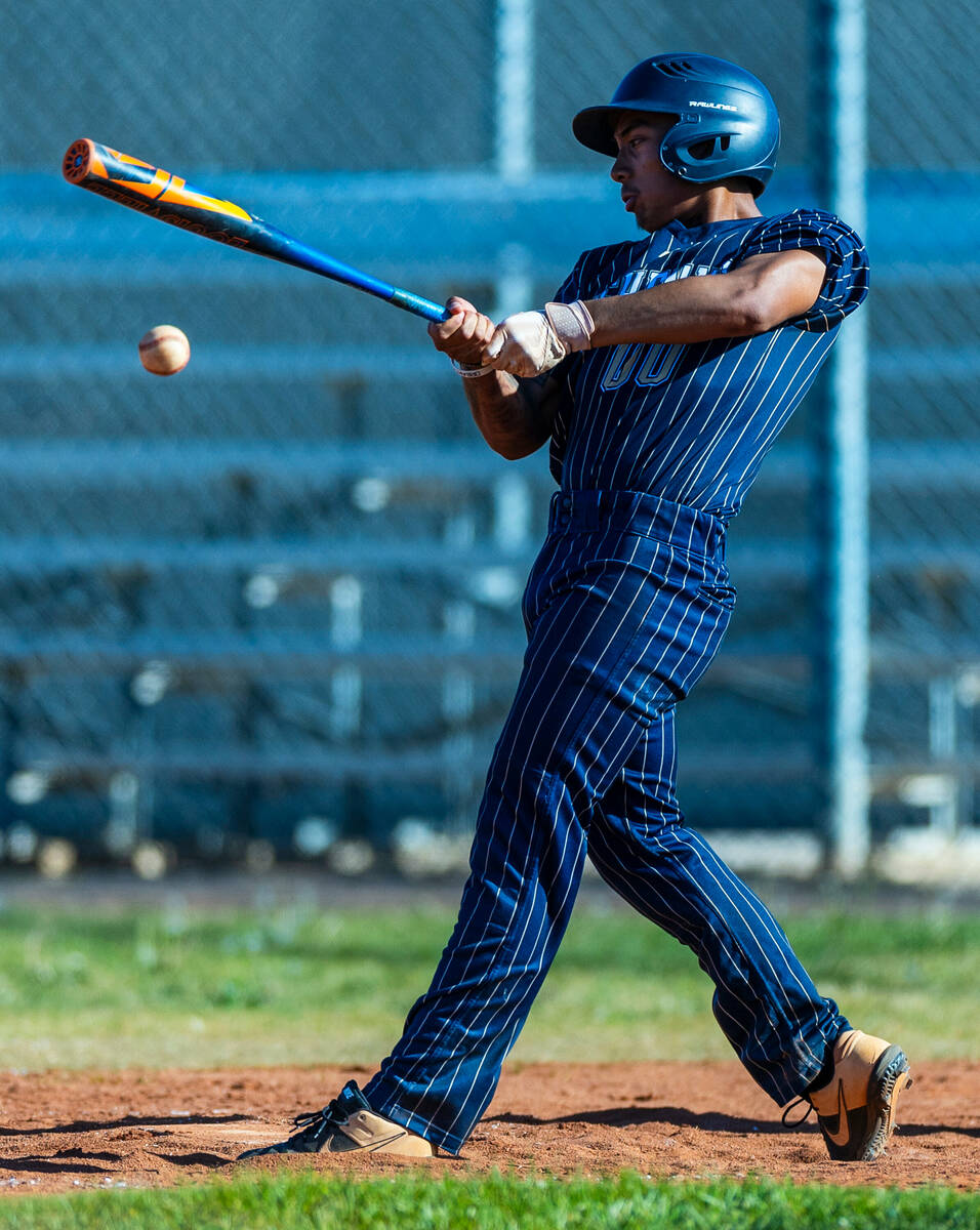 Cheyenne batter Noel Bravo connects for a hit against Tech during the fourth inning of their NI ...