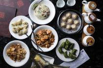From bottom left going clockwise: ShangHai rice cake, steamed fish dumplings, fried rice with c ...