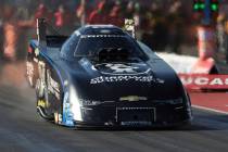 In this photo provided by the NHRA, Austin Prock competes in Funny Car qualifying during the NH ...