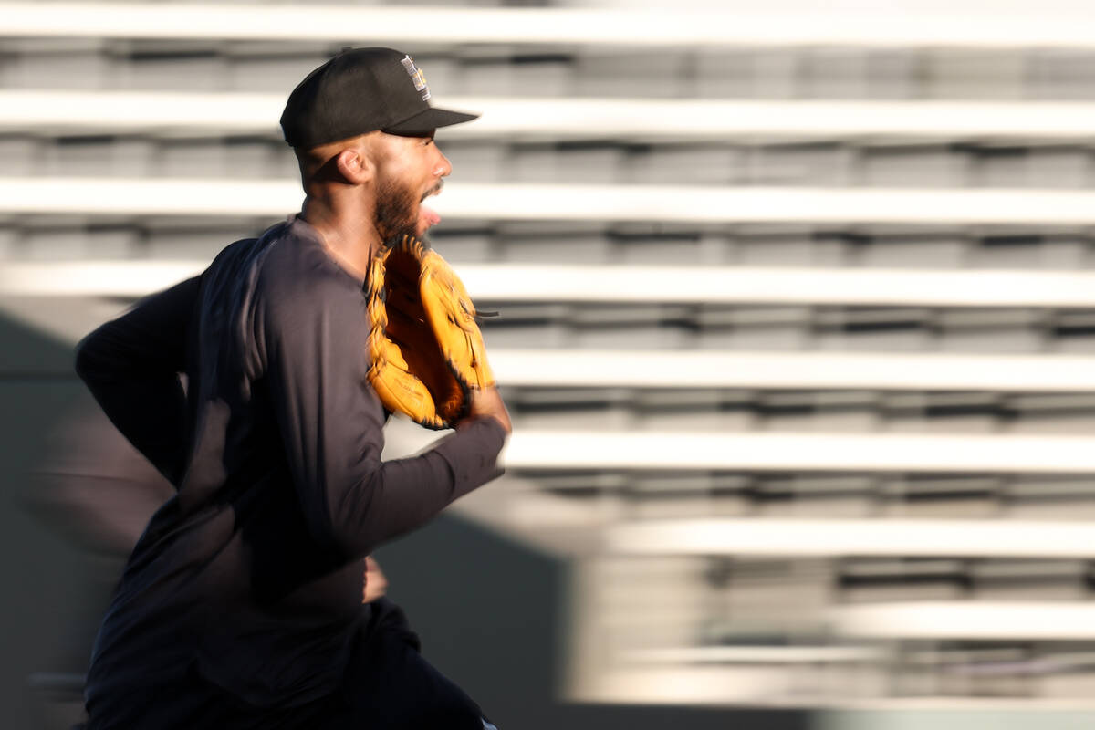 Salt Lake City Bees relief pitcher Amir Garrett runs in from batting practice before a Minor Le ...