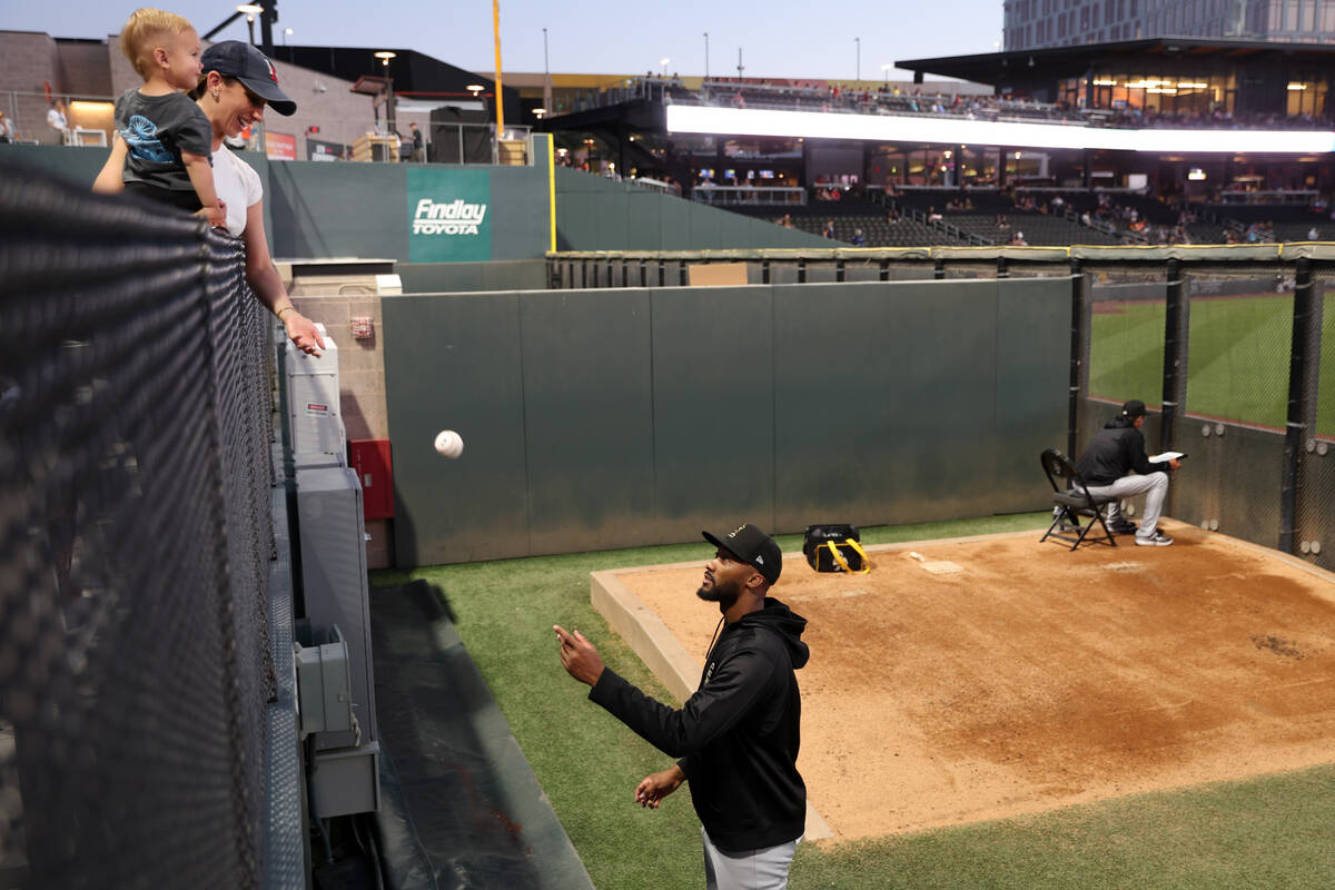 Salt Lake City Bees relief pitcher Amir Garrett hangs out with little ones during a Minor Leagu ...