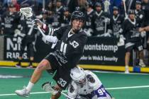 Desert Dogs forward Jack Hannah (33) readies to shoot as Panther City defender Matt Hossack (94 ...