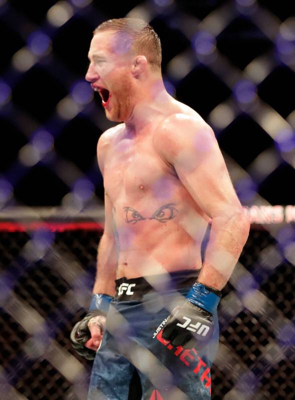 Justin Gaethje celebrates after winning his match against Tony Ferguson in a UFC 249 mixed mart ...