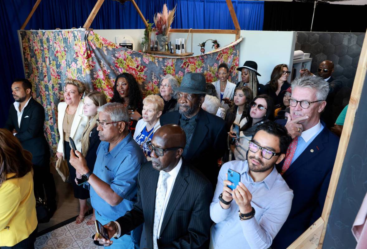 Supporters wait to see Vice President Kamala Harris walk to her motorcade after she spoke at a ...