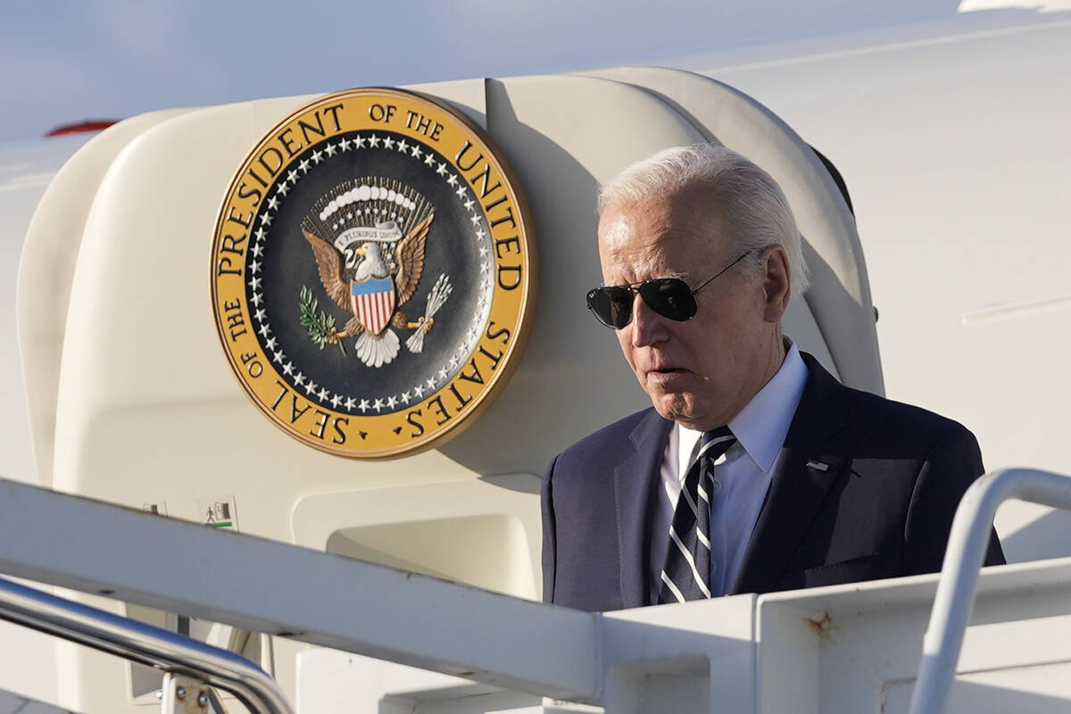 President Joe Biden boarding Air Force One at Andrews Air Force Base, Md., Friday, April 12, 20 ...