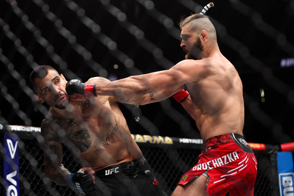Jiri Prochazka gets a left on Aleksandar Rakic during a UFC 300 mixed martial arts light heavyw ...