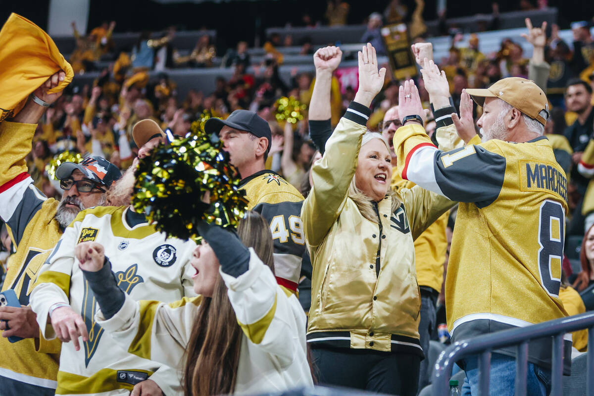 Fans cheer for a Golden knights goal that ended up being called back by the referees during an ...