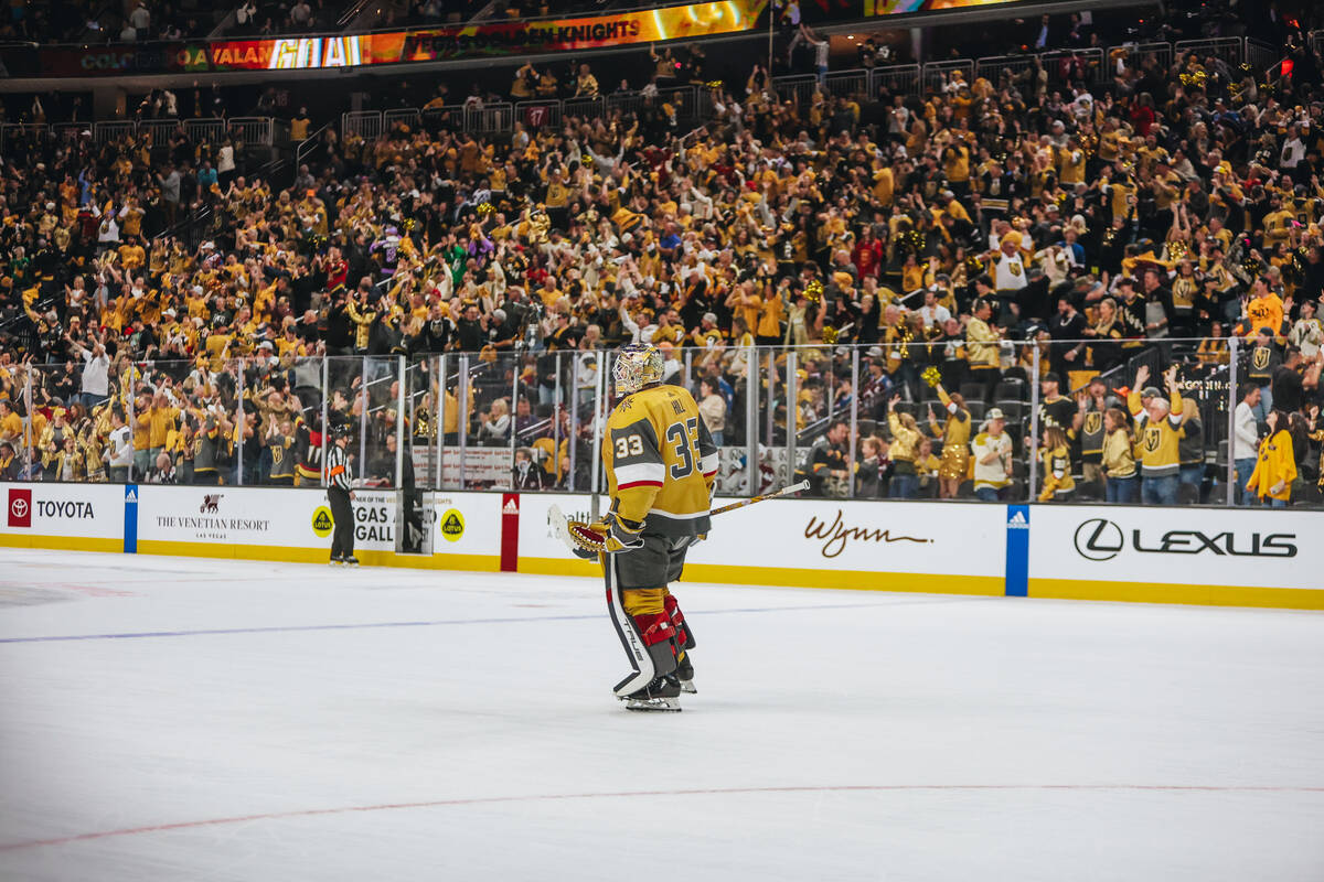 Golden Knights goaltender Adin Hill (33) skates off the ice after the Golden Knights win in ove ...