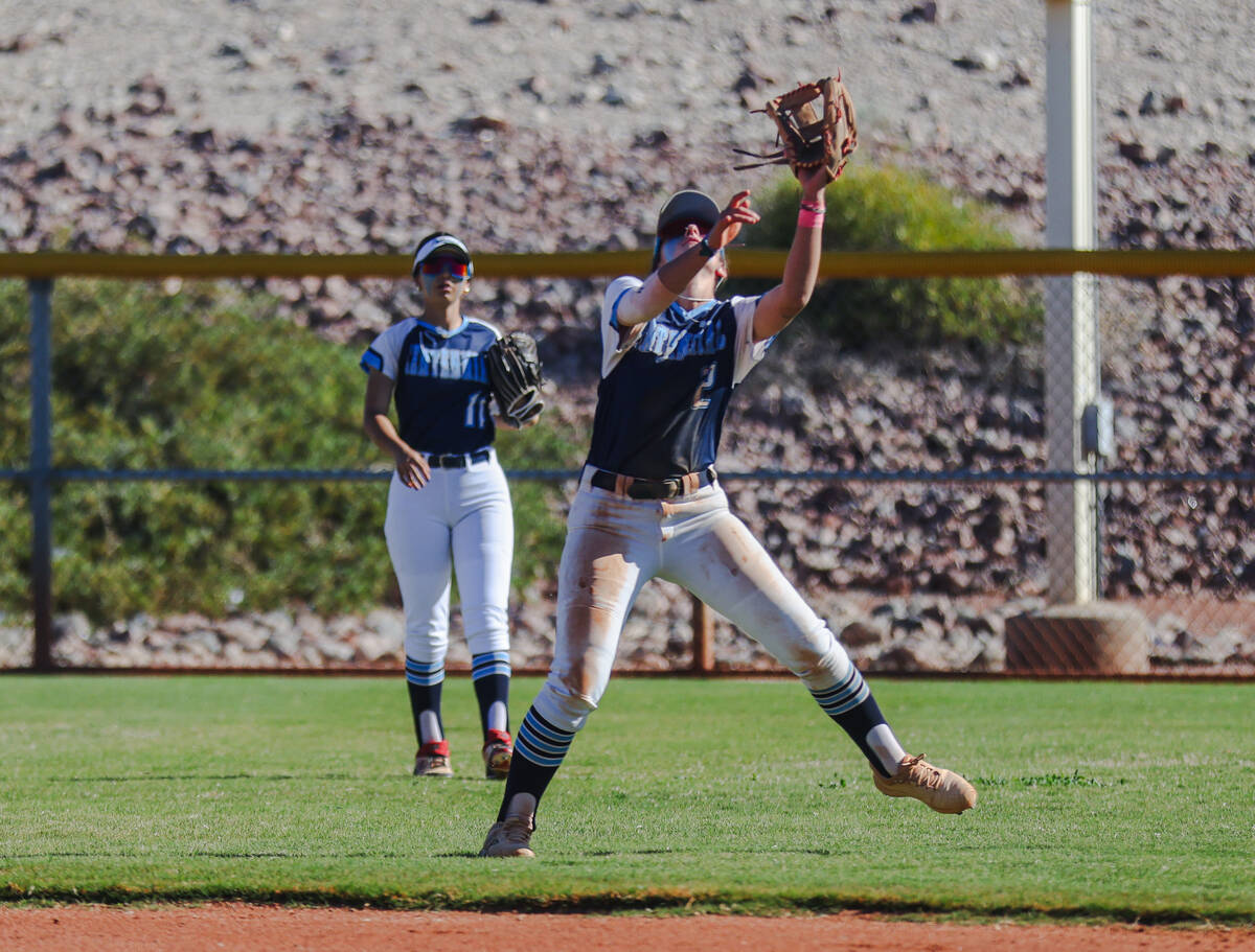 Centennial High School’s Juliana Bosco (2) fields a catch in a game against Liberty High ...