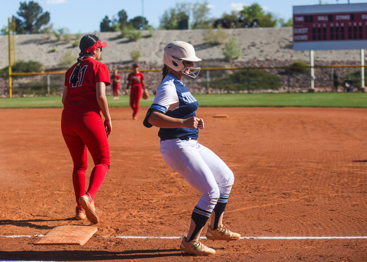 Centennial High School’s Campbell Cole (12) advances to first base against Liberty High ...