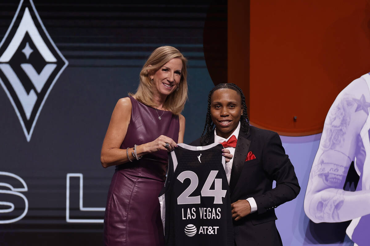 Syracuse's Dyaisha Fair, right, poses for a photo with WNBA commissioner Cathy Engelbert, left, ...