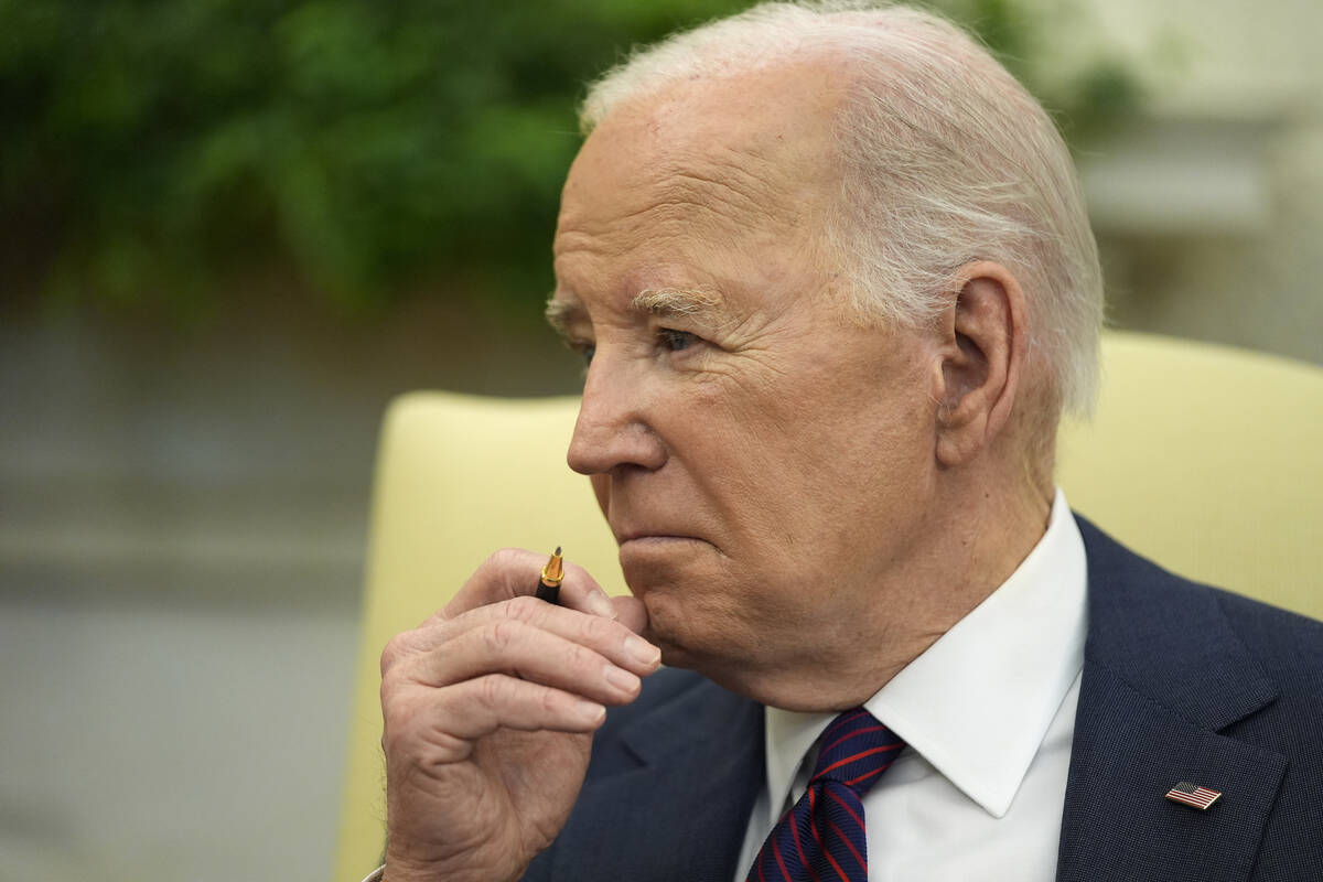 President Joe Biden listens during a meeting with Iraq's Prime Minister Shia al-Sudani in the O ...